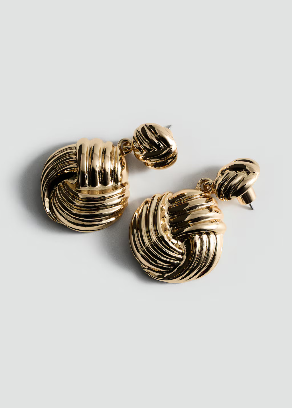 Intertwined design earrings | MANGO (UK)
