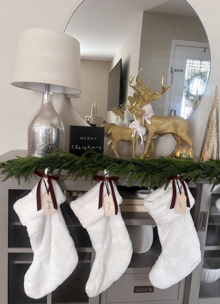 This Christmas console table is for sure my favorite this year!
Shop the perfect winter garland/Christmas garland - the Norfolk Garland from Kirkland’s is a perfect dupe for high end garlands. 

These white stockings are homegoods but linking similar!

Christmas mantle
Christmas console table
Christmas decor
Norfolk Garland
Affordable garland
Affordable Christmas decor 

#LTKHoliday #LTKSeasonal #LTKhome