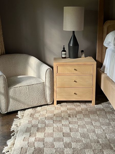 Our nightstands are quite old and out of stock, but here’s a few similar alternatives. 
Bedroom furniture, area rug, arm chair, home decor, interior design 

#LTKfamily #LTKstyletip #LTKhome