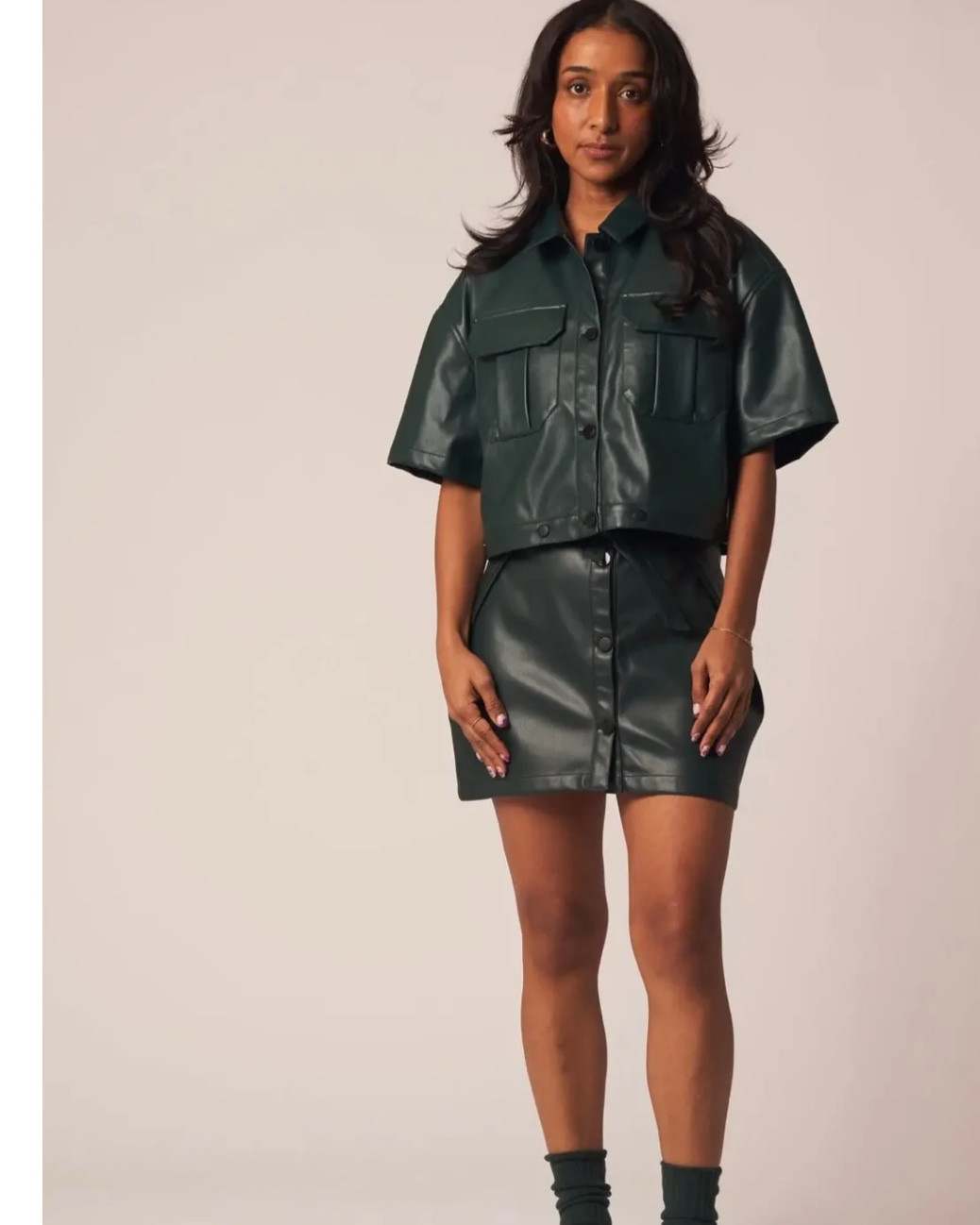 A fan-favorite 4-in-1 convertible dress is back and better than ever. Now in luxe faux lambskin leather with our signature Sea Moss green and sleek matte black finishes. This versatile piece still transforms into four distinct looks, making it the ultimate petite-friendly wardrobe investment.

How to Wear It:

Shift Dress: Sleek and polished, perfect for a one-and-done outfit. (Fit Tip: This style runs oversized — size down for a more true-to-size fit.)

Button-Down Shirt: Wear it fully buttoned for structure or open for a relaxed layer.

Cropped Jacket: Style the top as a modern layering piece to elevate any look.

Fully Lined Skirt: A chic, versatile bottom that pairs with your favorite tops year-round.

Design Details:

Pleated Utility Pockets: Fashion-forward with functional volume, proportioned for petites.

Relaxed Drop Shoulder: Creates a soft drape and a contemporary silhouette.

Snap Button Closures: Built for ease and durability, allowing quick transformation between looks.

#LTKGiftGuide #LTKSaleAlert #LTKCyberWeek