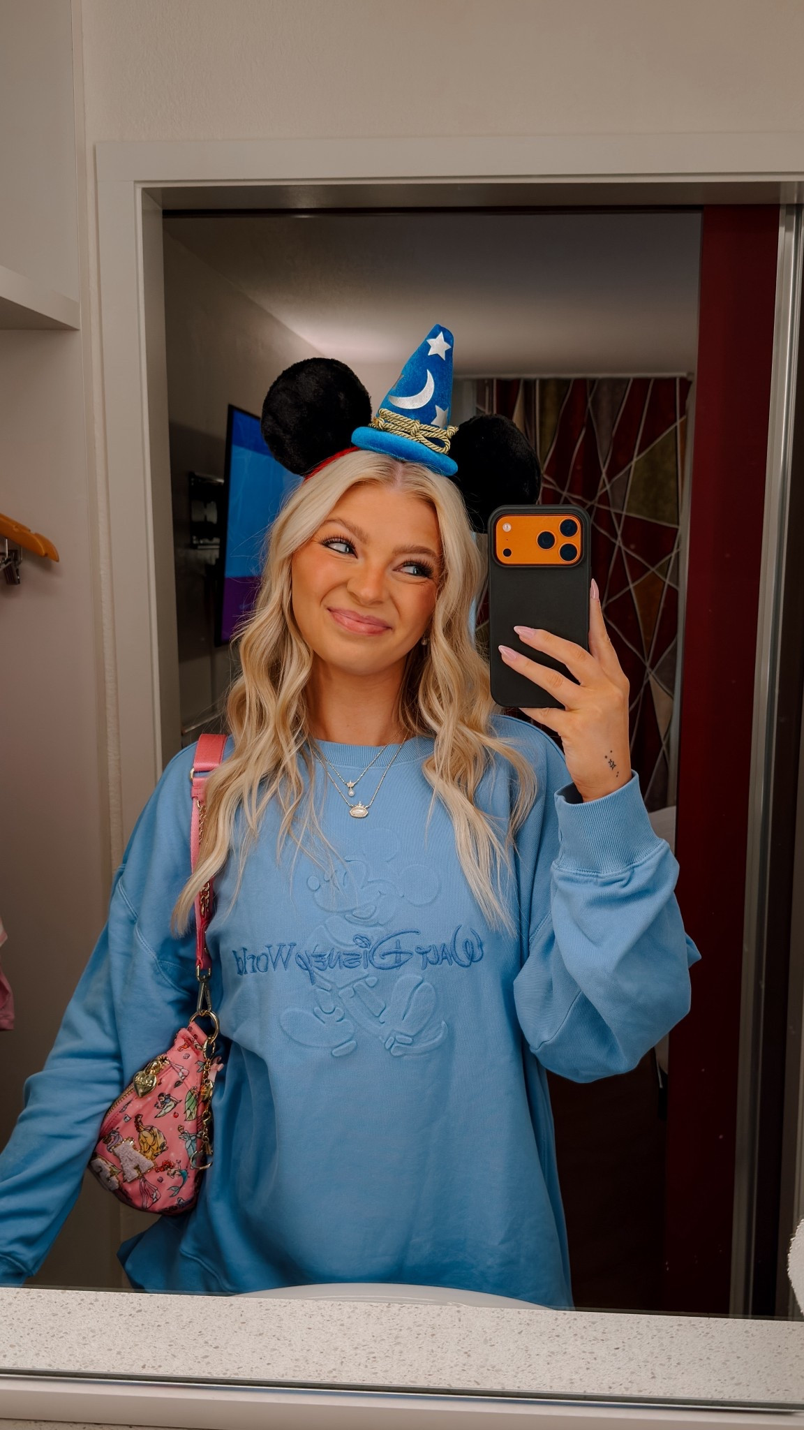 Blue Walt disney world sweatshirt 

Wearing a size large! 

#LTKdayinmylife #LTKgrwm #LTKootd