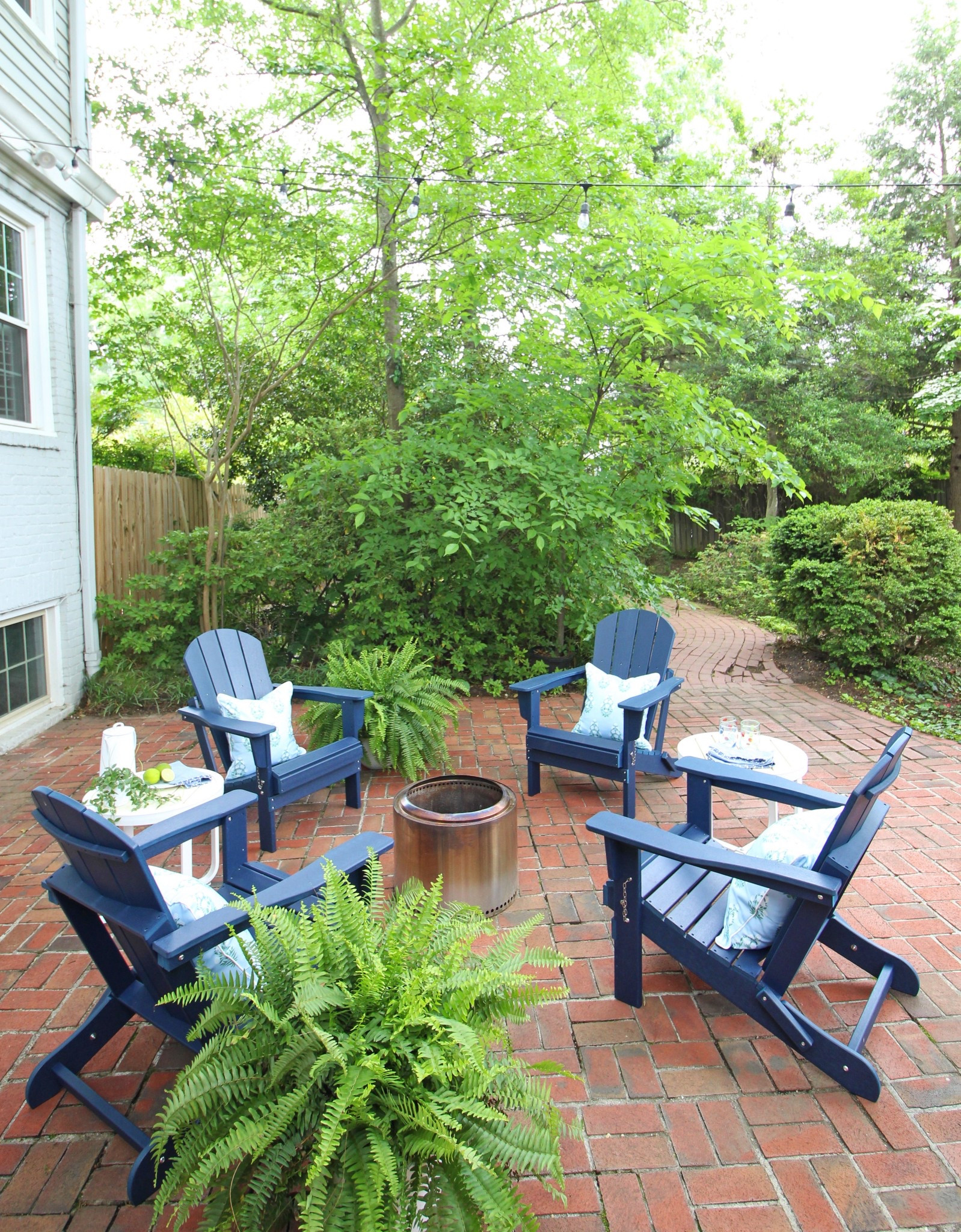 We gave our back patio a little makeover thanks to some new pieces from Wayfair! I loved that it
offered a one-stop shop for what we needed to give this space a nice little glow-up. These navy
Adirondack chairs are the star - they’re made of HDPE so they’re weather-resistant AND they
fold for easy storage! We also picked up some new planters for these big ole Boston ferns,
which I’m loving as we enter the summer. Find all the sources for our patio in my post here and
on the blog!

@wayfair #Wayfair #Ad