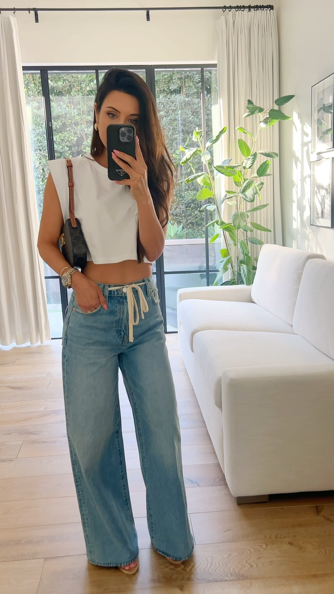 Loved these oversized jeans- wearing a 24 (sized down) and a small in the top 

#LTKOver40 #LTKStyleTip #LTKFindsUnder100