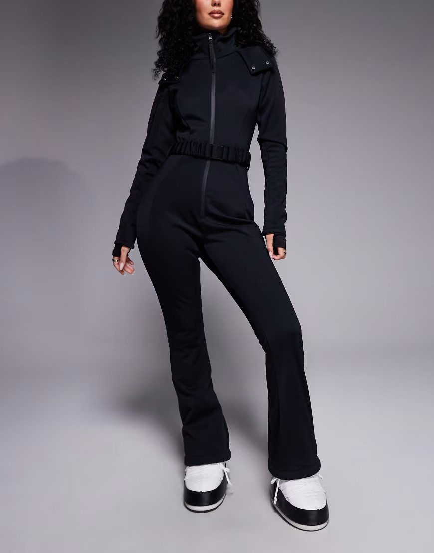 ASOS 4505 Hourglass Ski soft shell belted ski suit with slim kick leg and faux fur hood in black | ASOS (Global)