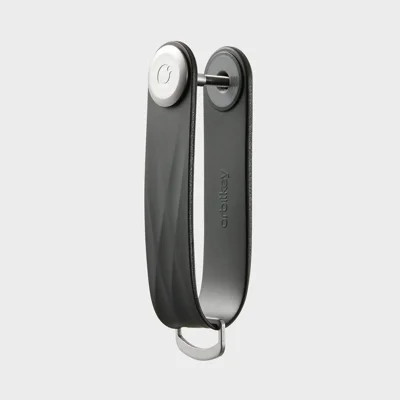 Orbitkey Key Organizer holding house keys in a slim black strap