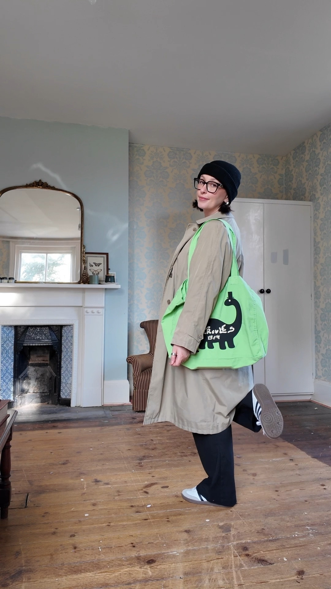 Comfy winter casual midsize over 40 outfit 

Tailored black trousers 
Black belt with silver buckle 
White t-shirt 
Cashmere jumper
Trench coat
Black wool hate 
Green dinosaur tote
Silver earrings 

#LTKuk #LTKmidsize #LTKeurope