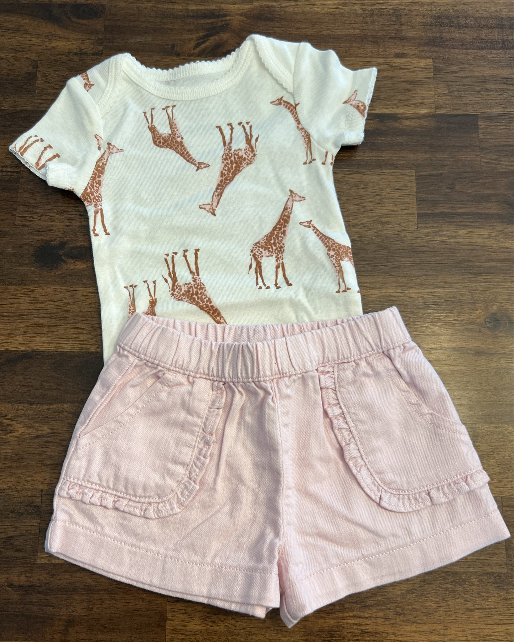 Loving these pink denim shorts - we pair them with so many onesies! 🦒🍼

& for $4.98 & to outgrow it by next month , you can’t beat this! 

#babyclothes #babygirl #easyoutfits #denim #ootd 

#LTKFamily #LTKBaby #LTKSaleAlert