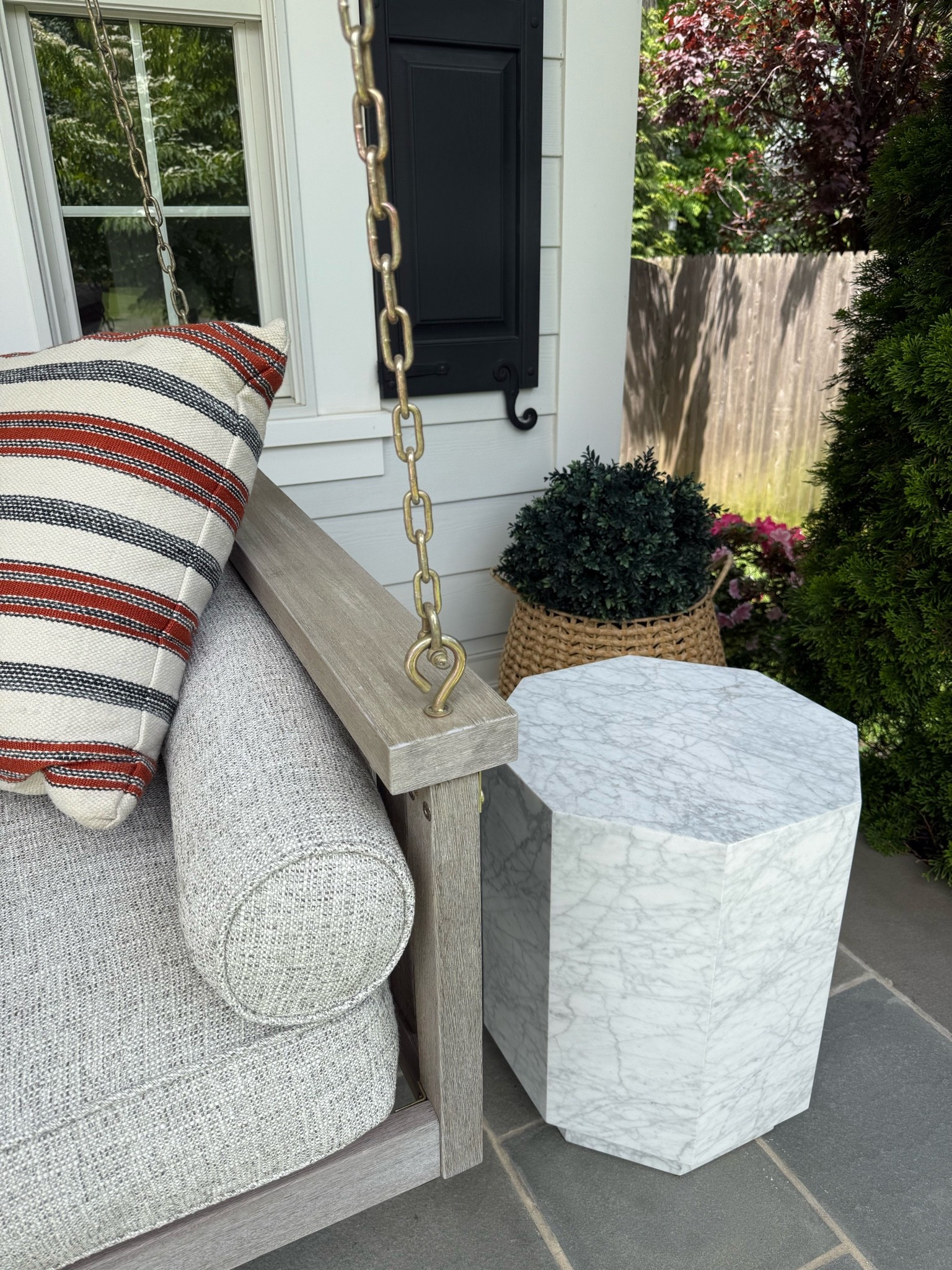 A few questions about our porch swing. Have had it for years and love it! I DID reupholster the cushions it came with because I wanted this specific fabric (from @tonicliving) and it’s been perfect. Linking our planters and side table too!

#LTKSaleAlert #LTKHome #LTKSeasonal