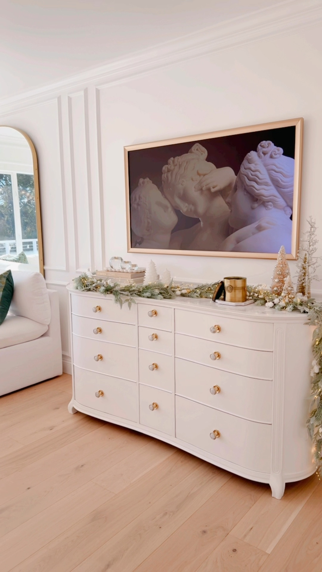 Found the most beautiful soft green garland that’s on sale for $11.99. 🎄I wrapped 2 together with twinkle lights, then layered a few bottle brush trees, candles, and little birds to pull the look together. Super simple and inexpensive  💫👏🏼


#LTKSeasonal #LTKHome #LTKHoliday