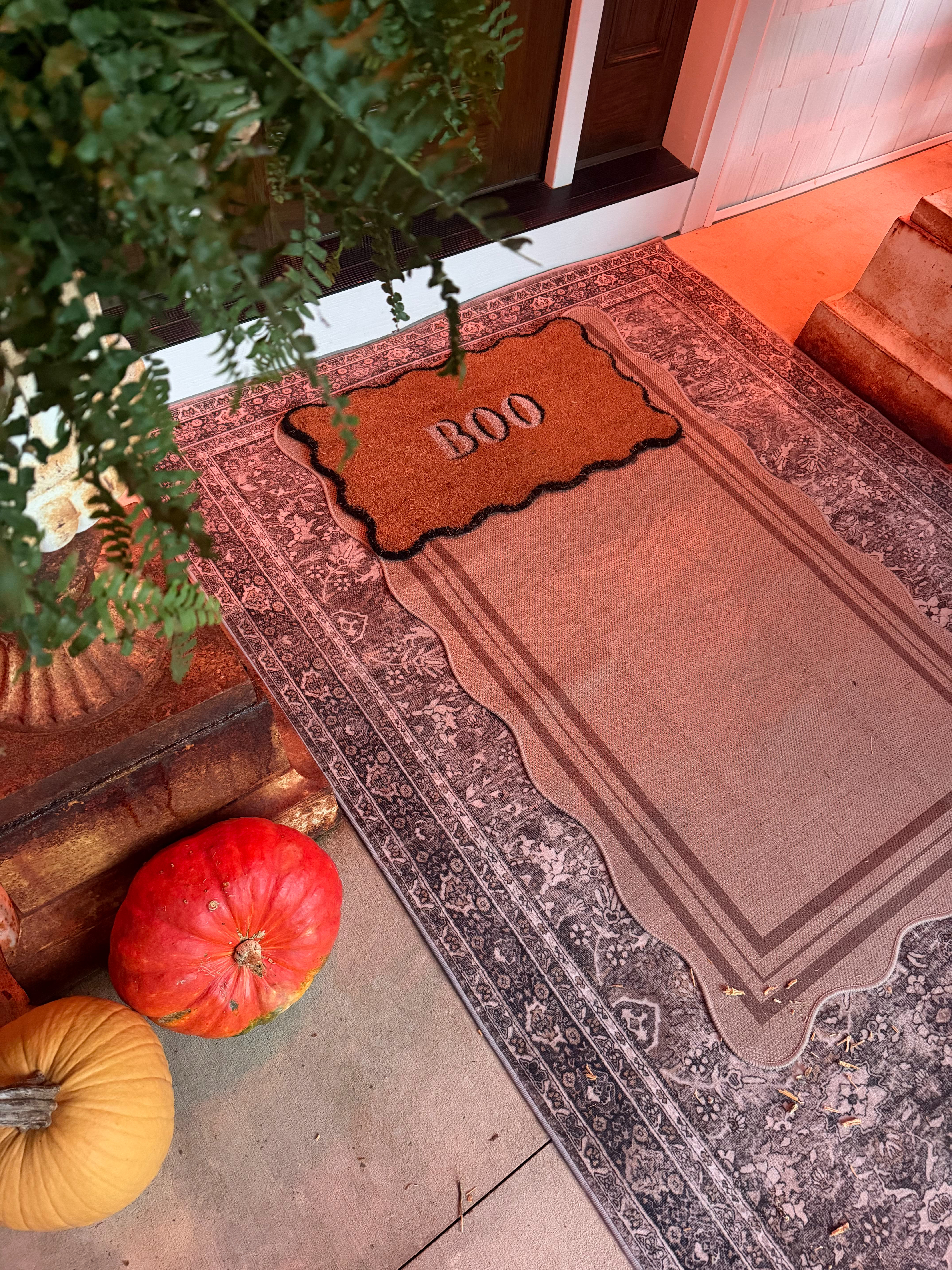 This year, I layered three area rugs and door mats together in front of our front door. I love the layered look it adds to our entryway.  

 #LTKSeasonal #LTKHome