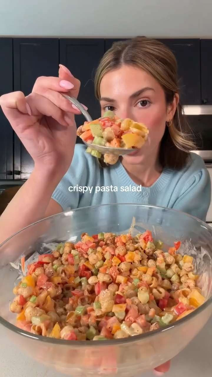 just love everything a little extra crunchy #pastasalad

1/2 pound mini shell pasta
2 celery ribs, finely diced
1 red bell pepper, finely diced
1/2 cup finely diced carrots
1/4 cup apple cider vinegar or white vinegar
1 tablespoon granulated sugar
3 tablespoons mayonnaise
1/4 cup plain Greek yogurt
1 tablespoon Dijon mustard
2 tbs olive oil
salt and pepper to taste
1 teaspoon Cajun seasoning, plus more to taste (optional)

Directions
1. Cook the mini shells in salted water until al dente. Spread on a sheet pan, drizzle with olive oil, and toss with Cajun seasoning if using
2. Bake at 350°F for 18 minutes, stirring once halfway through, until lightly crisp. Let cool.
3. In a large bowl, toss the celery, bell pepper, carrots, vinegar, and sugar. Let sit for 15–20 minutes. Then add the crispy pasta.
4. For the dressing mix the mayonnaise, Greek yogurt, Dijon, salt, pepper, and a pinch of Cajun seasoning if using. Pour on top of your pasta salad. Mix and serve cooled. 

 #LTKfoodie