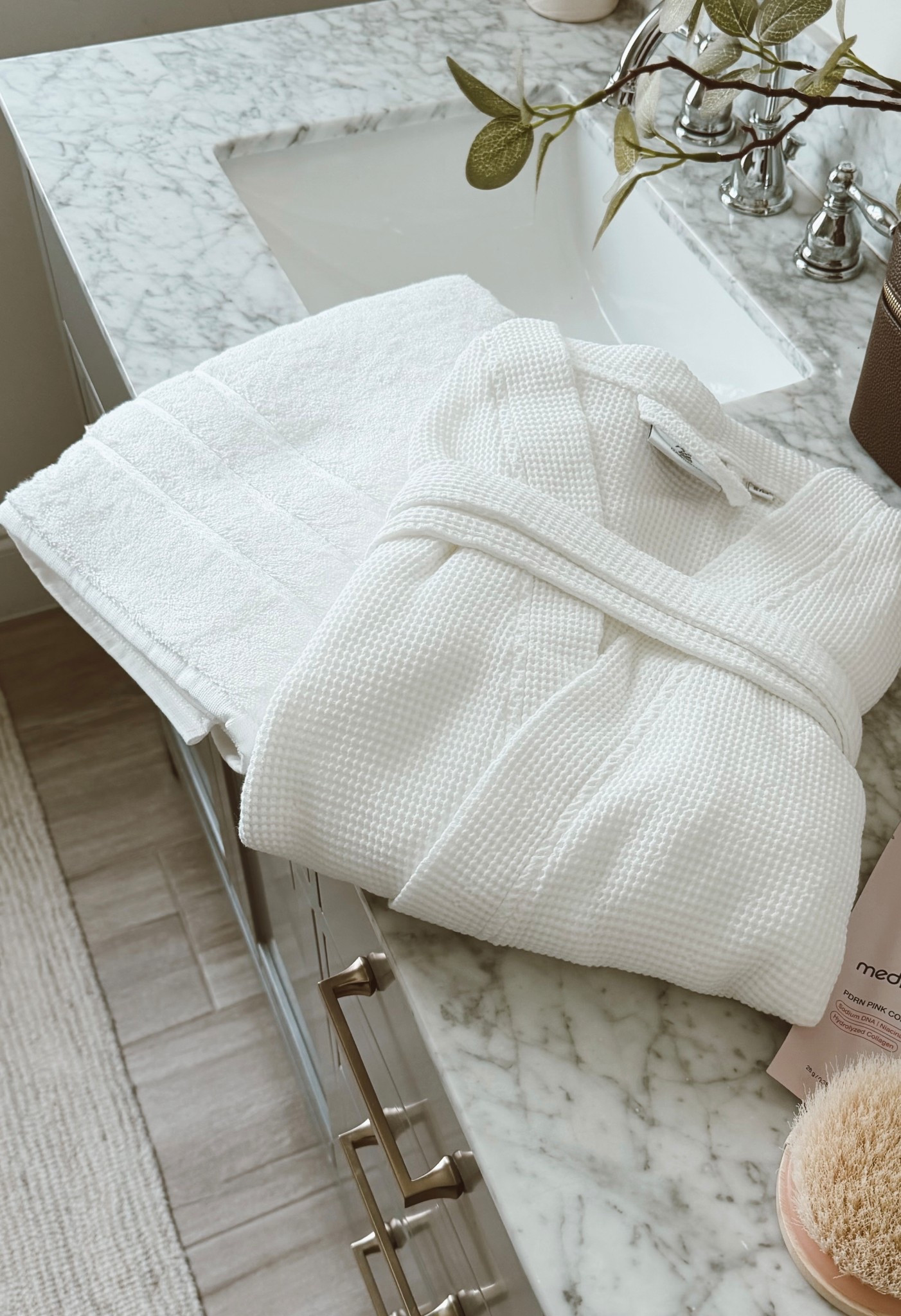 @cariloha robe & bamboo towel to elevate today’s everything shower 🧖‍♀️ 

These are SO soft and absorent - they feel like a spa ✨ 

Use code NEST35 for 35% off sitewide (25% off mattresses & frames) until 5/31

#ad #gifted #livecariloha #towels #robe #housewarminggift #mothersdaygift #spa #everythingshower

#LTKselfcare #LTKSaleAlert #LTKmorningroutine