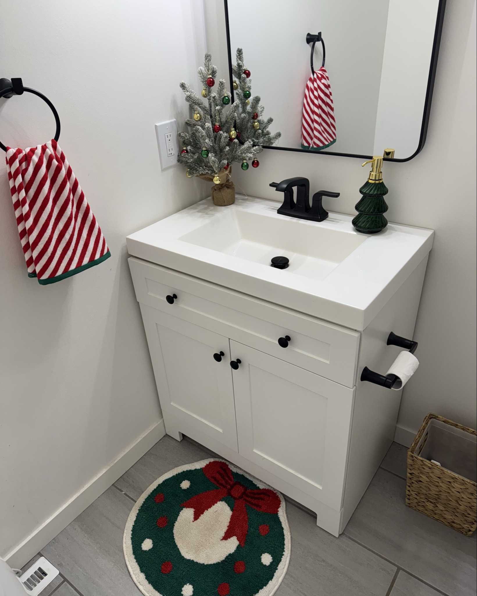 Guest bathroom, kids bathroom, wreath, bathmat, Christmas tree, striped towel, mini tabletop artificial tree with mini ornaments, bathroom decor, black and white bathroom, Christmas decor, holiday decor, home finds 