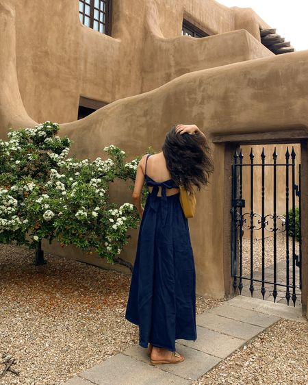 i’m in love with this dress!! it’s 100% linen and this navy color is so beautiful. it has adjustable straps and a tie back (which is darling). i love how the fabric drapes and moves when you walk, too  wearing an XS here. 

bag is vintage gucci! 

#linendress #maxidress #openbackdress #navydress #bluedress #summerdress #vacationoutfit #europeoutfit #quietluxury 

#LTKeurope #LTKFind #LTKsalealert