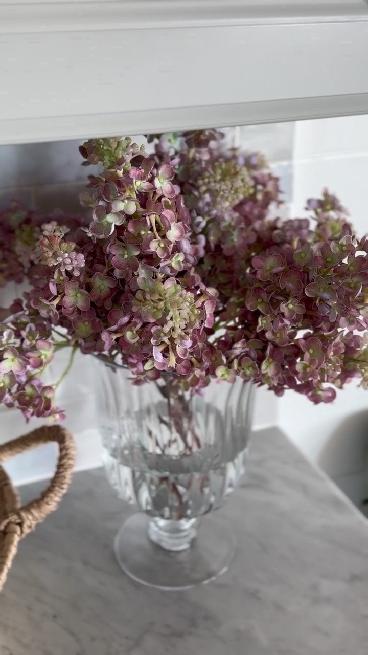 I have 7 of these faux real touch lilac stems styled in our kitchen and it’s the prettiest muted pop of color!! 

#LTKHome #LTKStyleTip