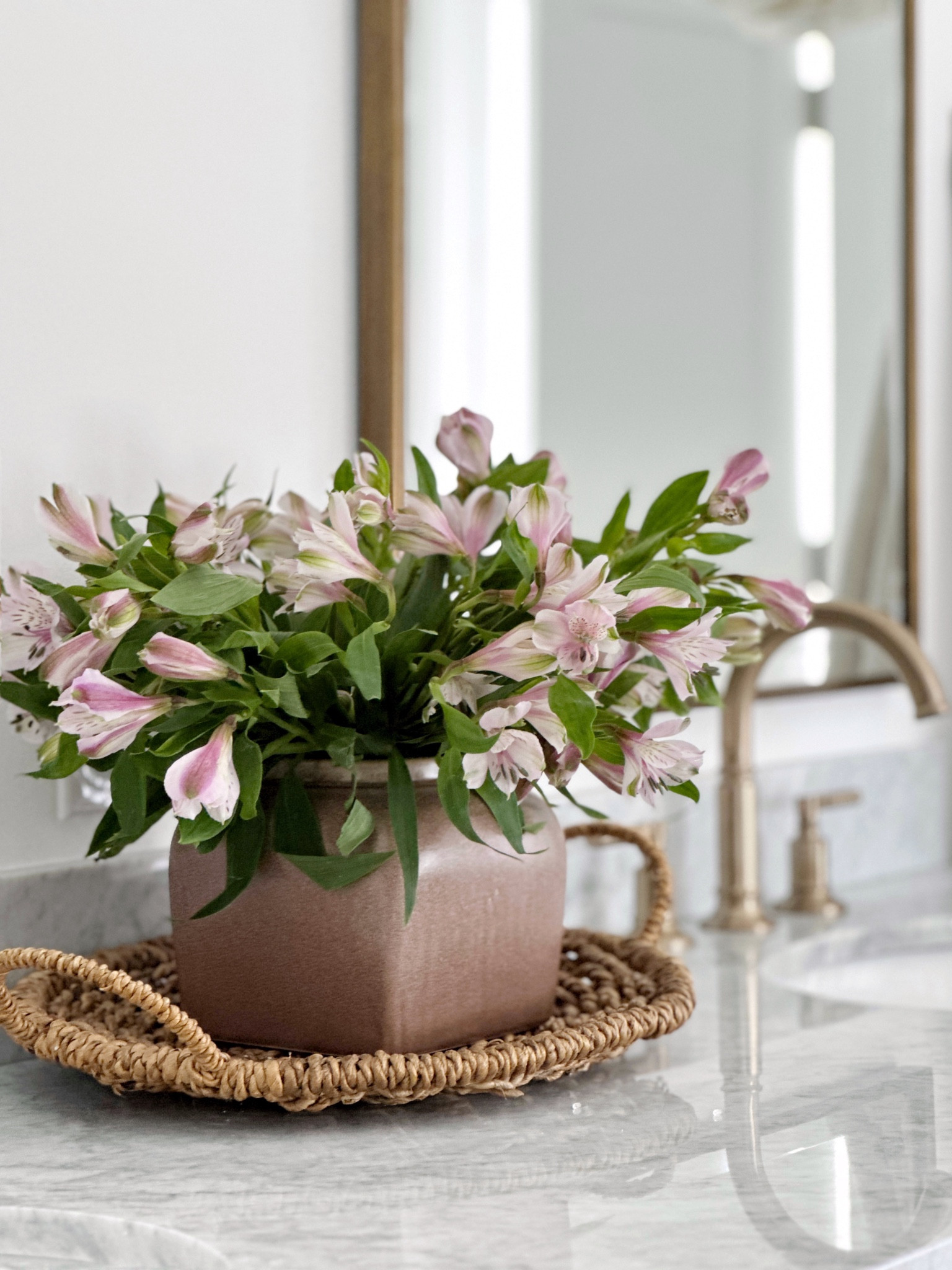 Floral arrangement in bathroom with Target vase by Studio McGee and basket tray. Faucet and mirrors linked also.



#LTKstyletip #LTKhome #LTKSeasonal