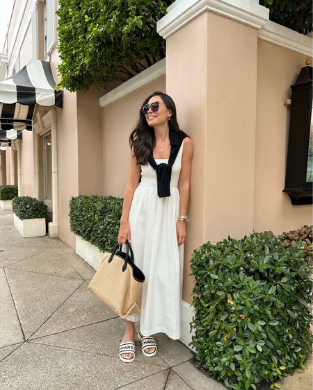 Kat Jamieson wears a white dress in Palm Beach. Chanel sandals, Khaite raffia tote, everyday bag, Florida, spring outfit, vacation style. 

#LTKitbag #LTKSeasonal #LTKshoecrush