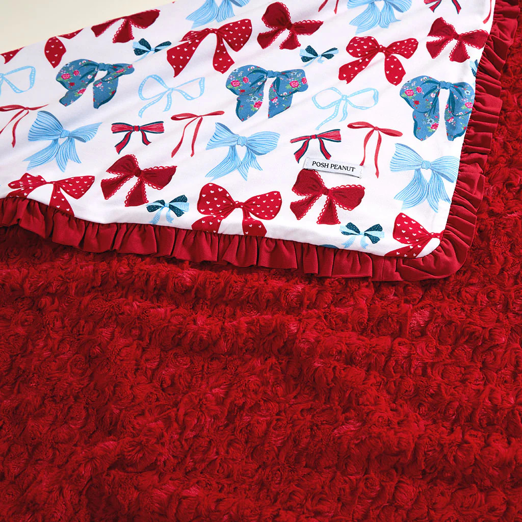 Bows White Reversible Martha Minky Ruffled Luxette Patoo\u00ae Blanket | Posh Peanut\u00ae | Posh Peanut