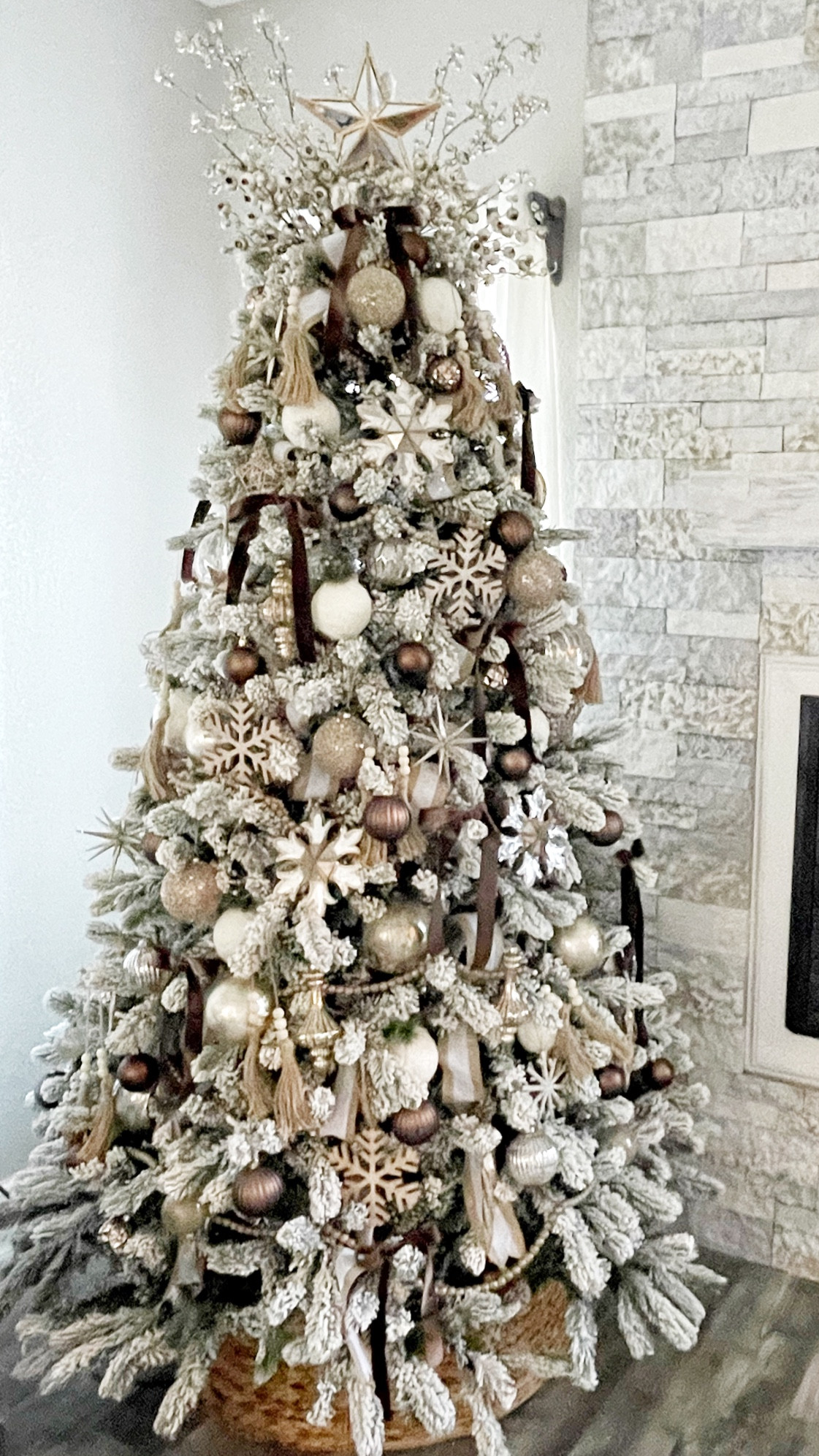 2022 Christmas tree  
Mercury glass snowflake ornaments, white sweater ornaments, and large wood snowflake ornaments came from Hobby lobby. 

#LTKSeasonal #LTKHoliday #LTKstyletip