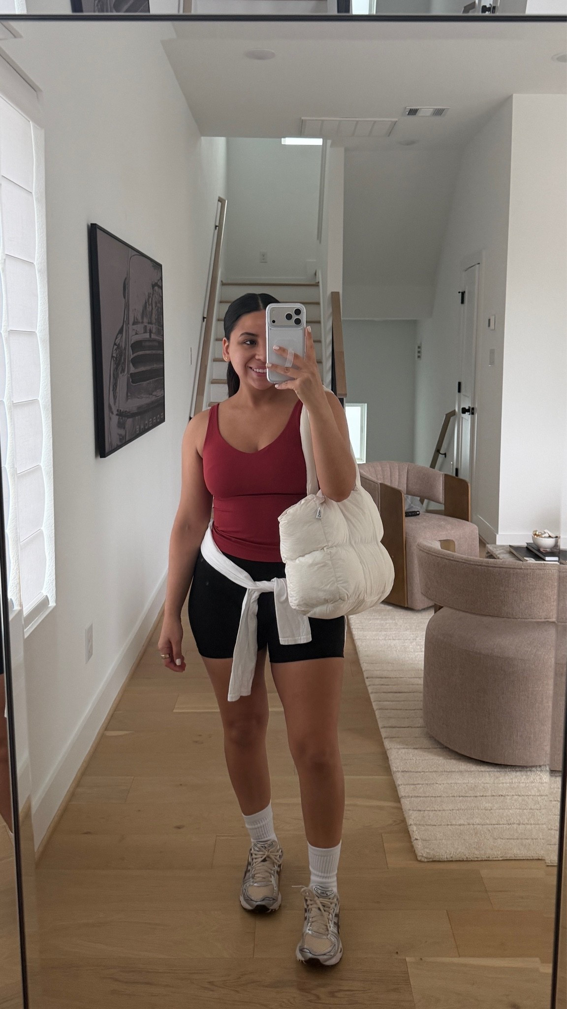 Biker shorts: small
Tank: small
Long sleeve wrap: small
Sneakers: 6.5 women 
Puffer tote bag 
White socks

#LTKootd #LTKfitnessgoals #LTKActive