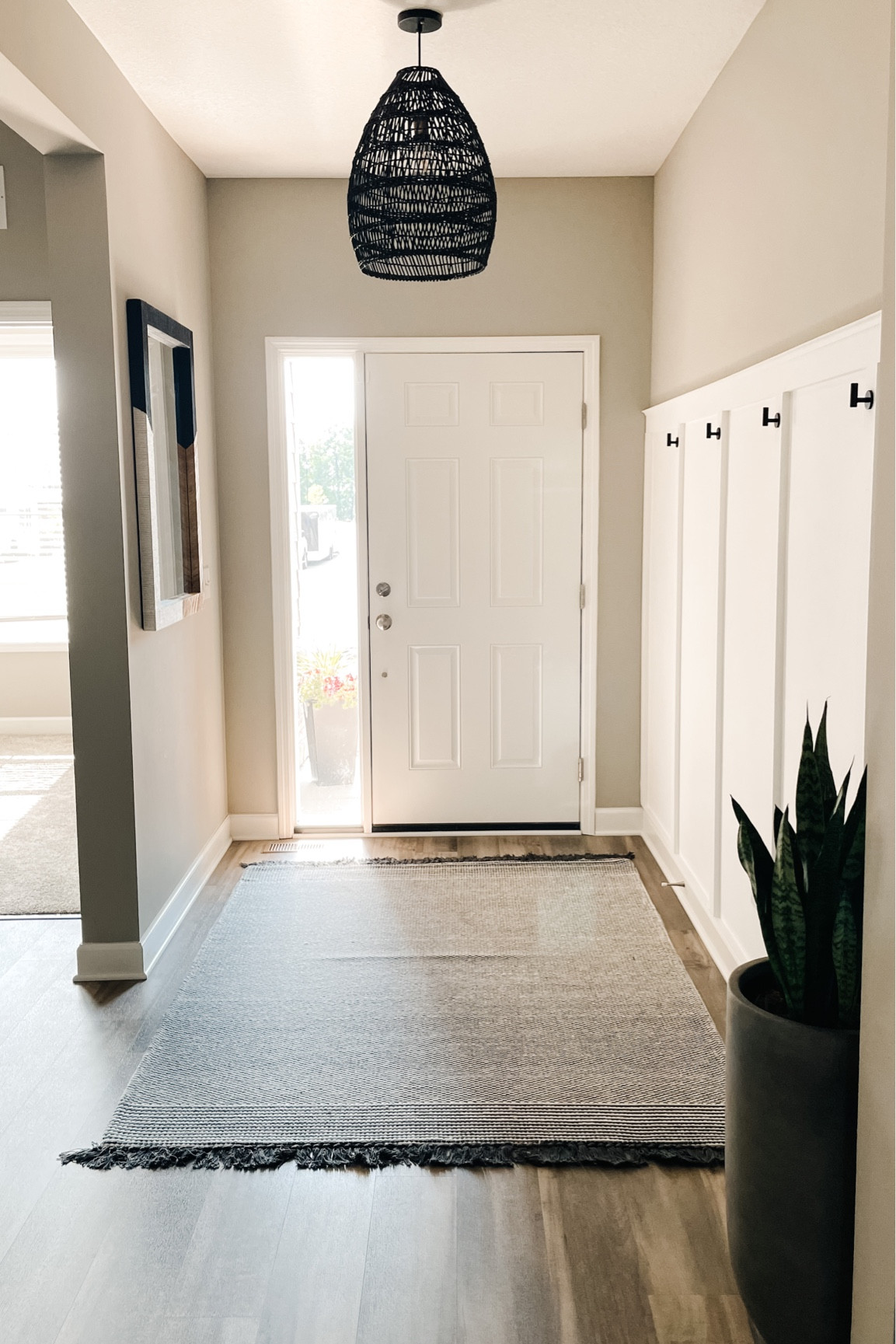 DIY entryway! Rug is from target but no longer on site. Linked planter and similar pendant lights - can’t find the exact one. 
#homedecor #home #DIY

#LTKhome