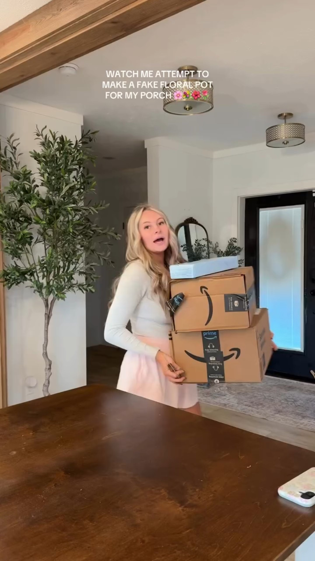 You know what, let me go take it all down… I think it would be cute if I took the fern out and put it in an INDOOR pot and made it a centerpiece. Something about it being on the porch is throwing me off… what do yall think?