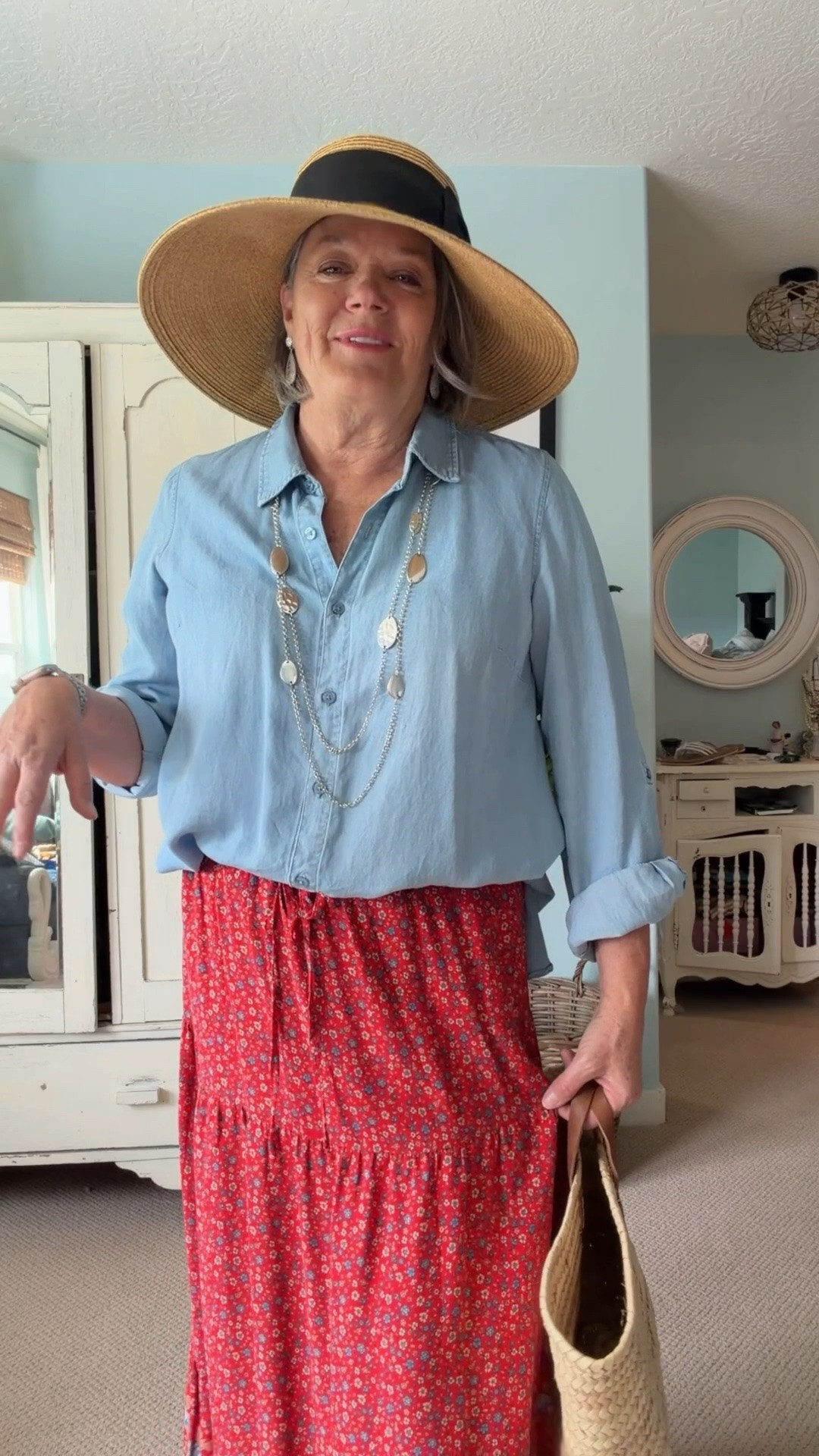 I love to stretch my wardrobe don’t you? Today I am sharing 5 ways to style this blue shirt. 
First up is over some white jeans with red sneakers and a baseball cap. 
Next I’m wearing it with a long silver necklace a black cuffed linen capris and black sandals. Changing it up now I am wearing the blue blouse with my favorite flowy red skirt, brown sandals, straw hat and straw bag. 
These pink pants look fabulous with the blue blouse half tucked the pants are from Costco! 
Last but not least the red skirt, blue blouse with a longer denim jacket, a blue western styled purse and leather boots. #blueblousestyled5ways #blueblouse #stretchyourwardrobe

#LTKMidsize #LTKootd