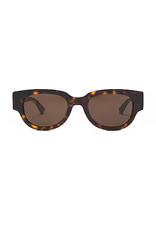 Bottega Veneta Nude Triangle Cat Eye Sunglasses in Havana from Revolve.com | Revolve Clothing (Global)