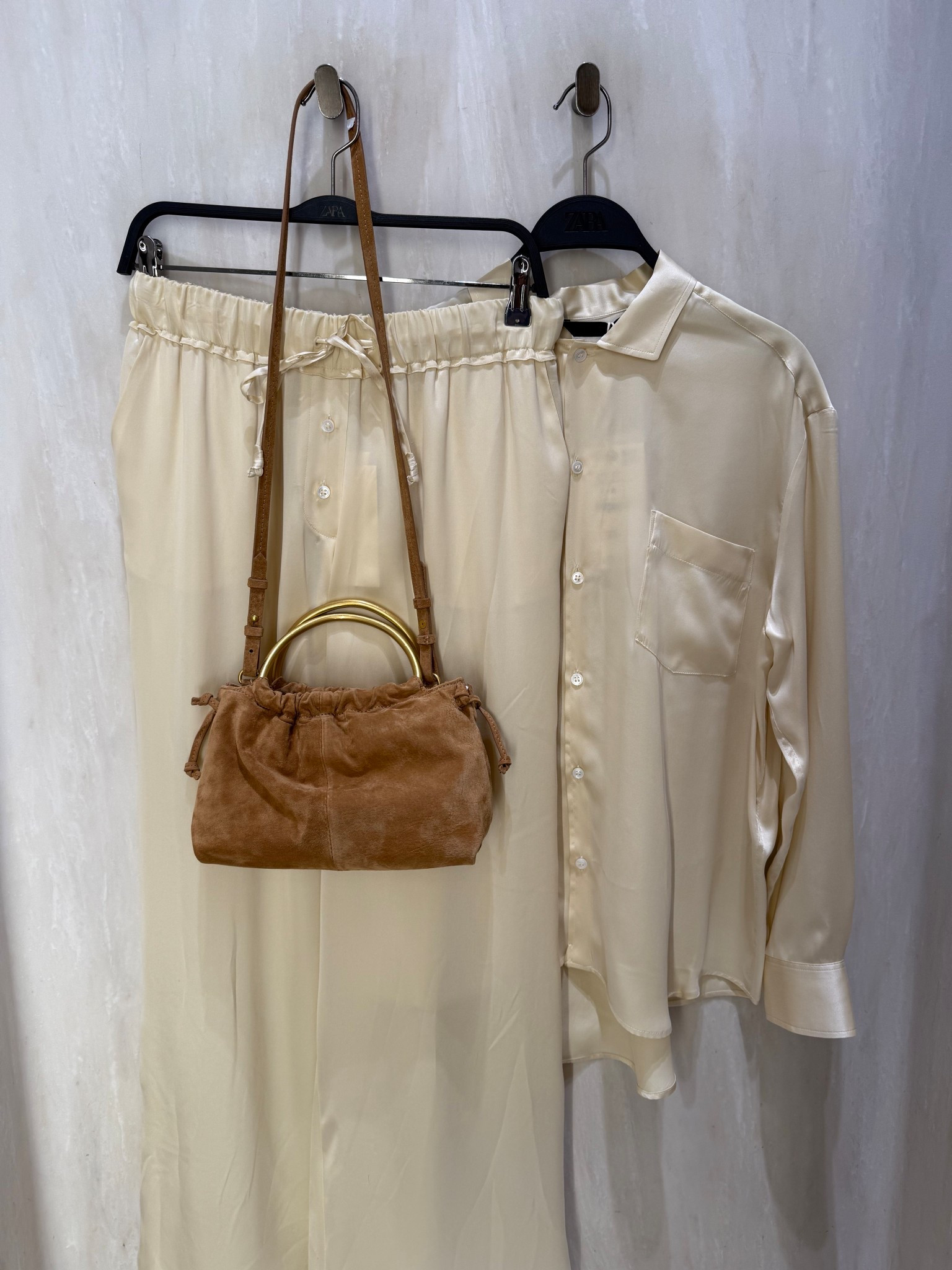 Butter yellow silk set🌼
Tags: Zara button up trousers wide leg flowing shirt with pocket detail suede bag fashion summer inspo outfit ideas chic women’s style Dubai date night st tropez 

#LTKsummer #LTKstyletip