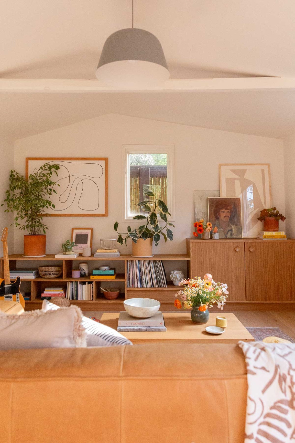 Mid century modern eclectic living room - lounge space - seating area - earthy interiors - shelf styling

#LTKstyletip #LTKfindsunder100 #LTKhome