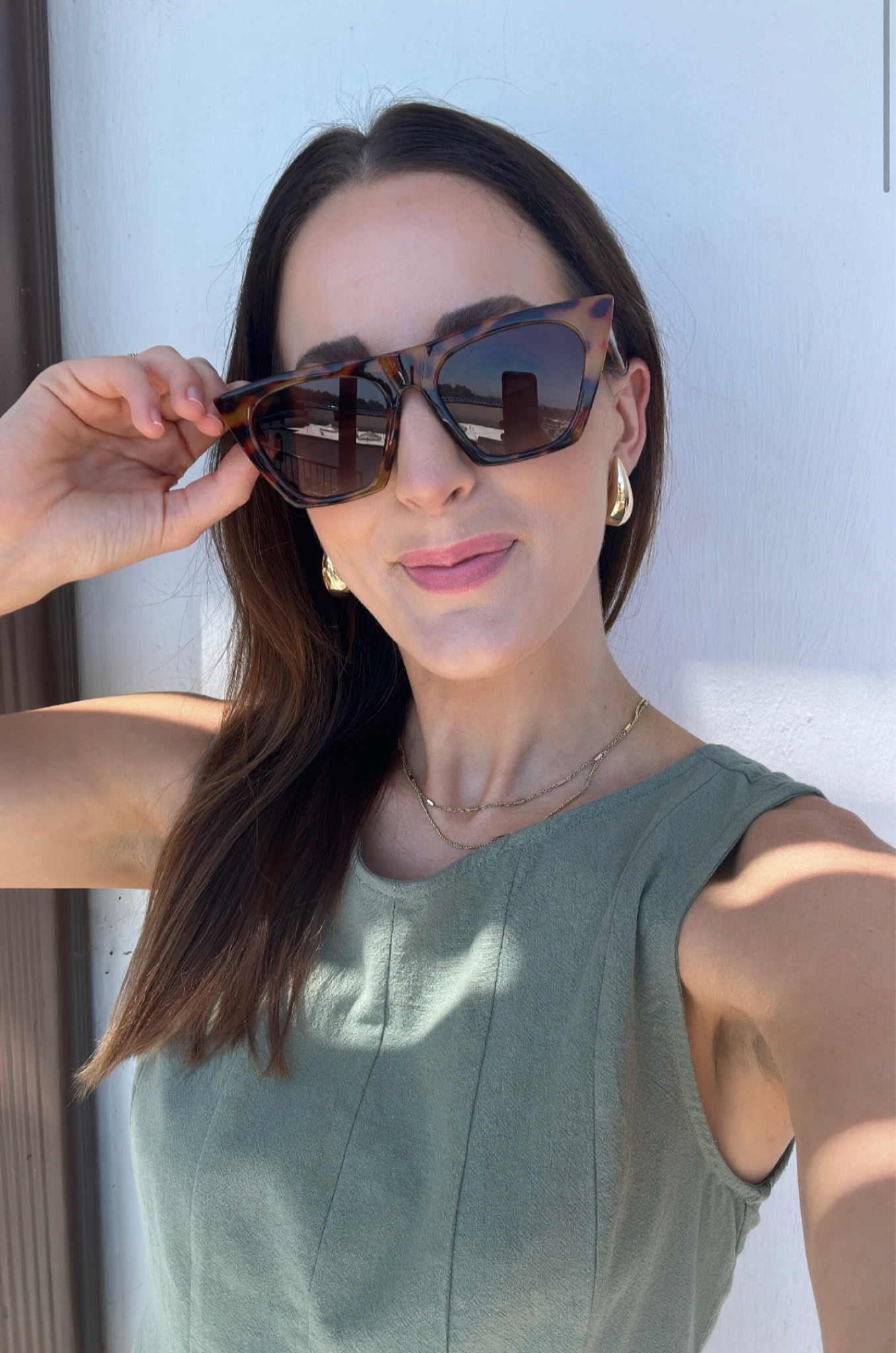 Amazon summer fashion: shop this sleeveless summer romper paired with trendy oversized glasses and gold hoop earrings on Amazon! I am wearing a small in the romper! 

#LTKFind #LTKstyletip #LTKunder100