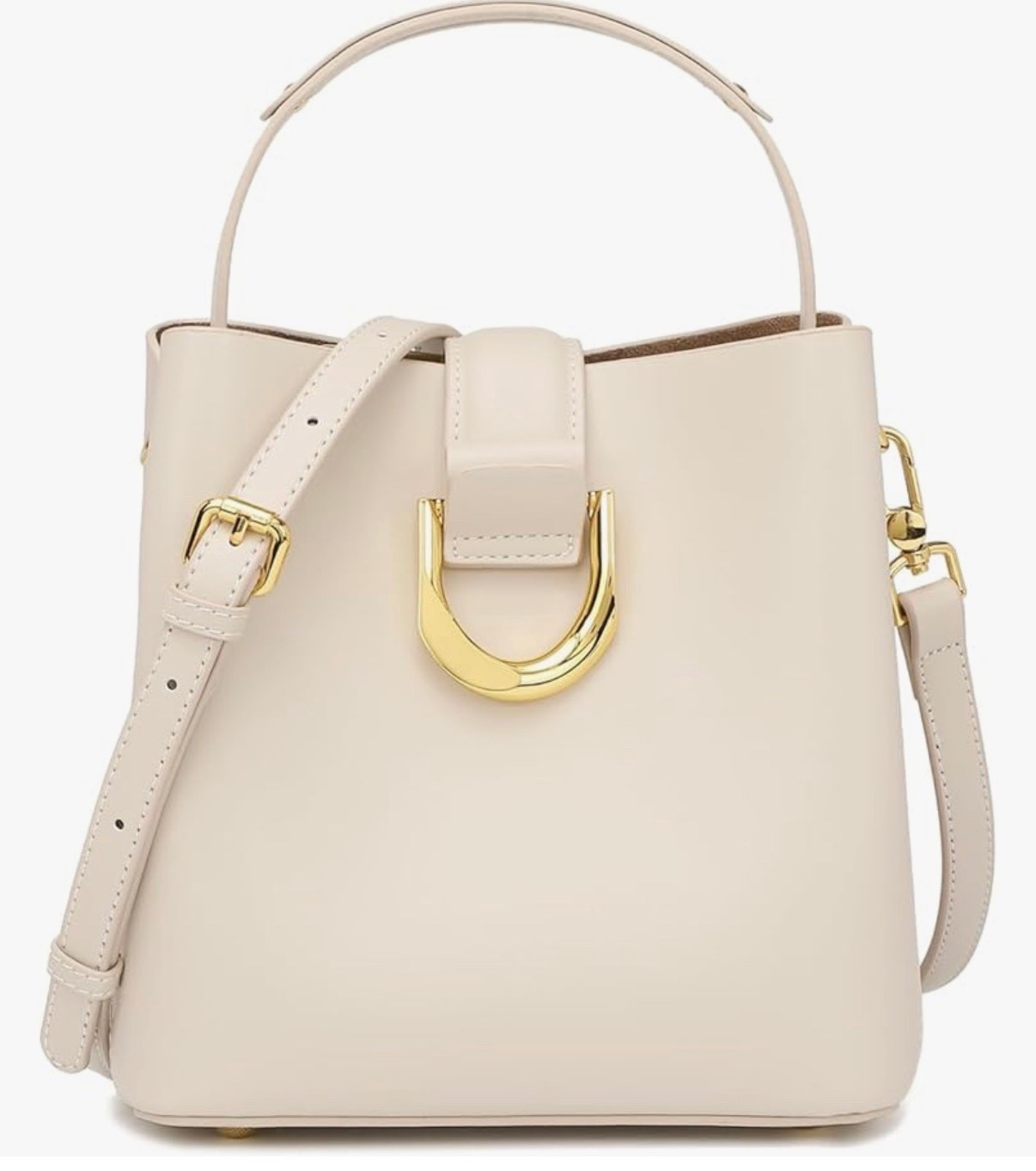 BEST crossbody purse to take on travel. Detachable and adjustable long strap, cute handheld strap, real leather, and chic.

#LTKOver40 #LTKTravel