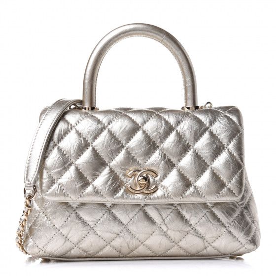 CHANEL

Metallic Aged Calfskin Quilted Mini Coco Handle Flap Gold | Fashionphile