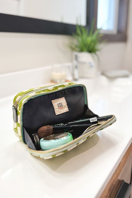 Functional storage with a double zip makeup bag. Bonus points if one section opens fully. 

This bag was a limited edition find ages ago. Linking similar functioning makeup bags in a few different sizes, depending on your makeup storage needs. 🤎

#LTKFind #LTKitbag #LTKbeauty