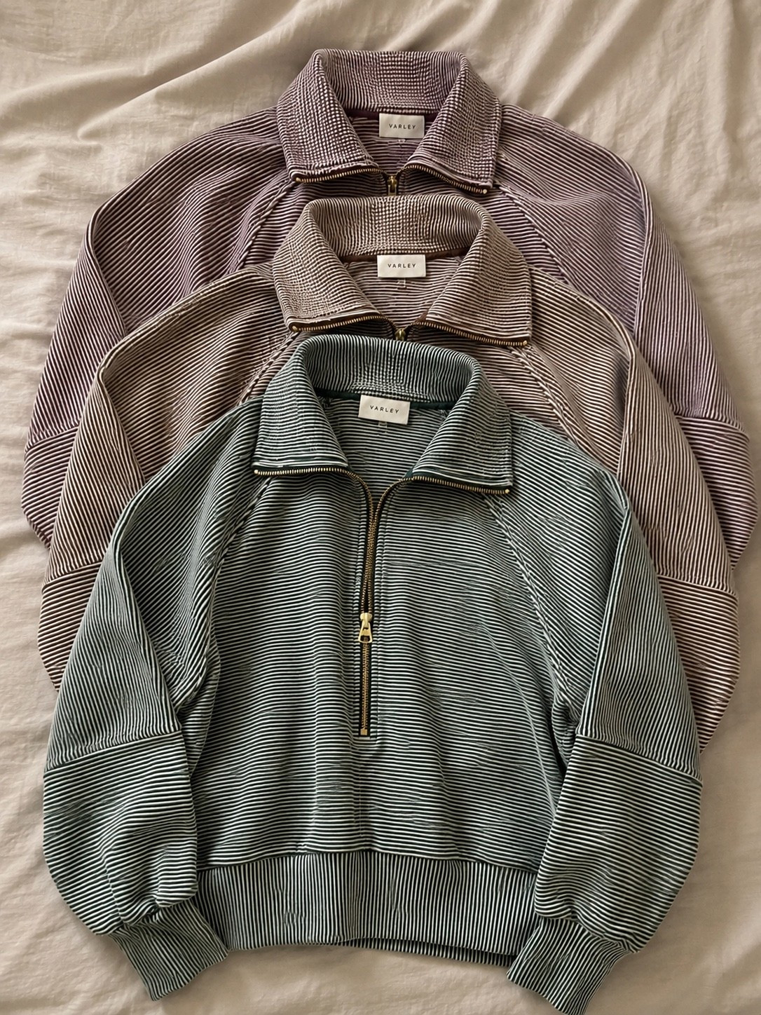 VARLEY MILANO HALF ZIP SWEATSHIRT ☁️🤍

The cutest elevated basic you’ll wear on repeat. The Milano Half Zip has an oversized, relaxed fit with buttery soft fabric, gold hardware, and the prettiest stripe that makes it feel so luxe. I love layering it over leggings for coffee runs, travel days, or cozy mornings…it gives that effortless “put together” look without even trying. ✨💕