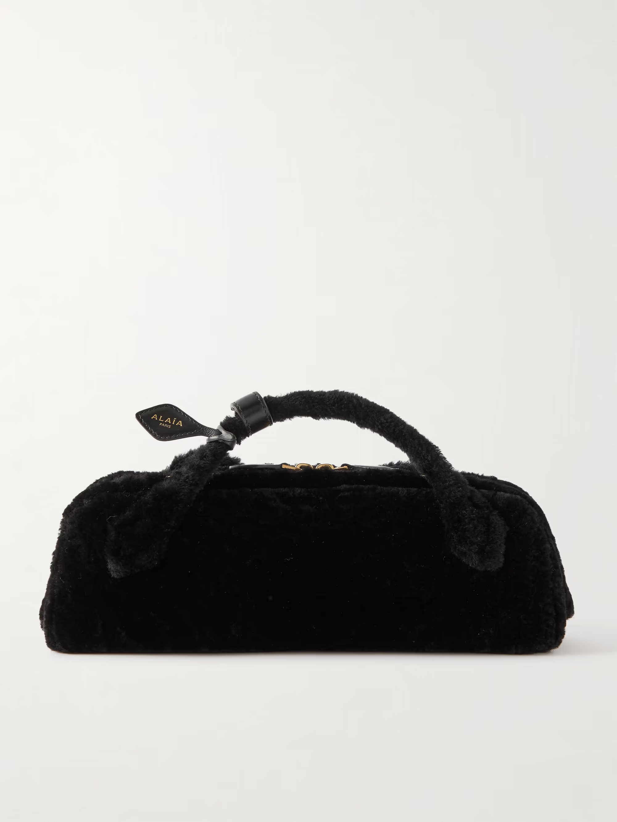 Le Teckel leather-trimmed shearling clutch | NET-A-PORTER (UK & EU)