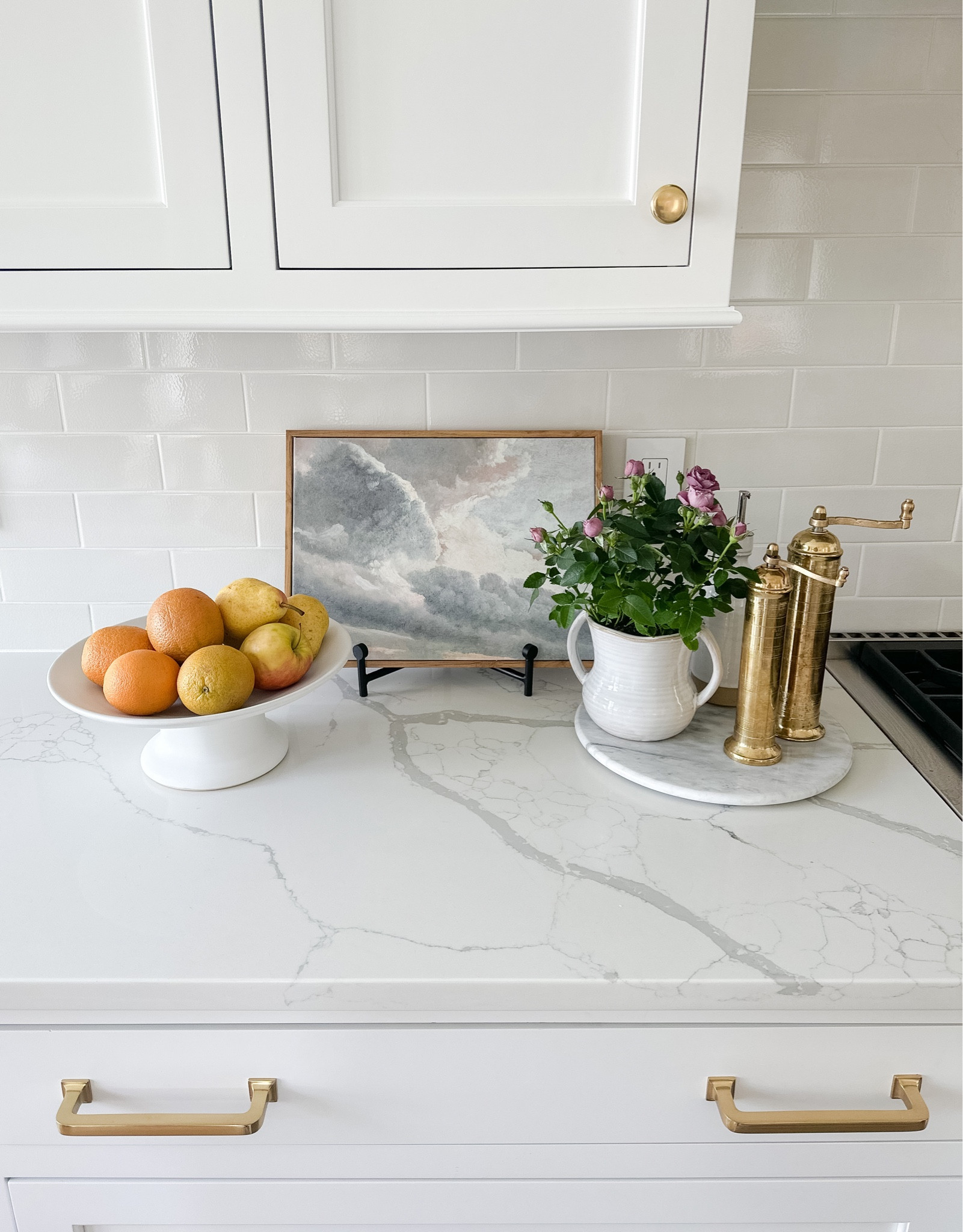 On sale!! Our brass salt and pepper grinders - footed fruit bowl / cake stand, and black easel. This cloud art is only $20 on Amazon! 

#LTKstyletip #LTKhome #LTKsalealert
