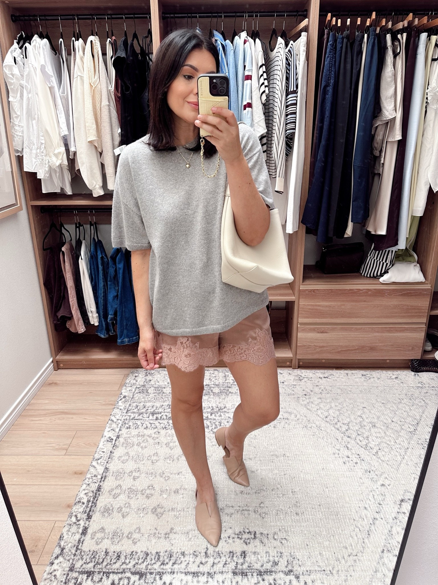 One of my favorite purchases from the last two years — this oversized sweater tee! I’m in the medium.

These silk shorts are the best! Under $100 too! I’m in the large
