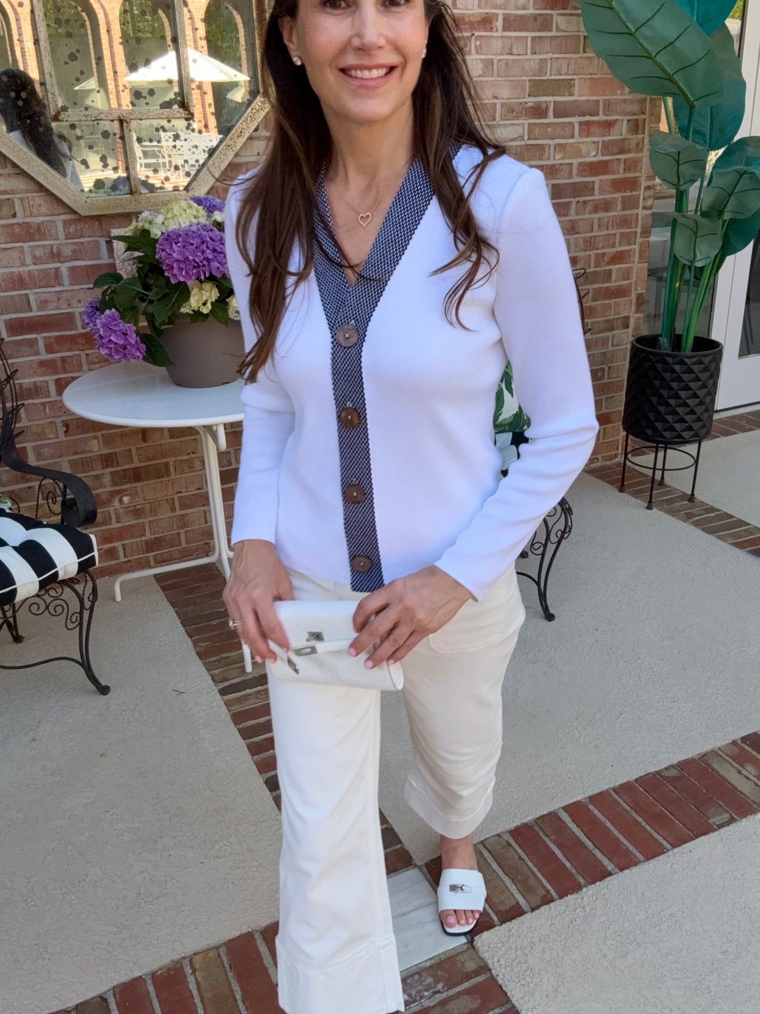 White Cardi + White Denim = Effortless Spring Uniform

Spring's here with Summer on its way! 
My roses are blooming and hydrangeas are beginning to green. 

This white cardigan set welcomes this Spring weather. A knit cardi with black textured trim, shell underneath along with cropped wide leg jeans give minimal color, but maximum impact. 

Newly launched collection by @Family_Savvy x @MingWangOfficial embraces timeless style with a modern edge.

#LTKOver40 #LTKgrwm #LTKootd