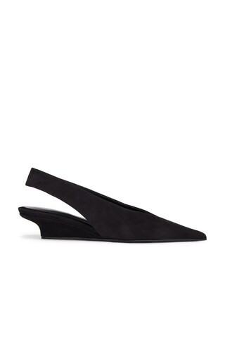 Toteme The Wedge Heel Slingback in Black - Black. Size 40 (also in 39). | FWRD 