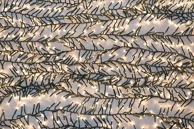 50' Connectable Cluster Light Garland w/ 1,500 Warm White LED Lights on Green Wire | Amazon (US)