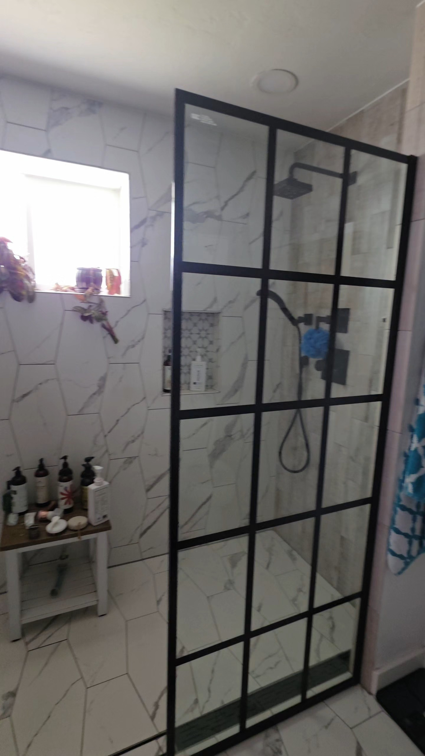 This shower squeegee has become one of those tools I reach for constantly, not just on the glass but on windows and mirrors too. It's a simple one piece design that actually keeps streaks and water spots away without any extra effort. #showersqueegee #cleaningtips 

 #LTKHome