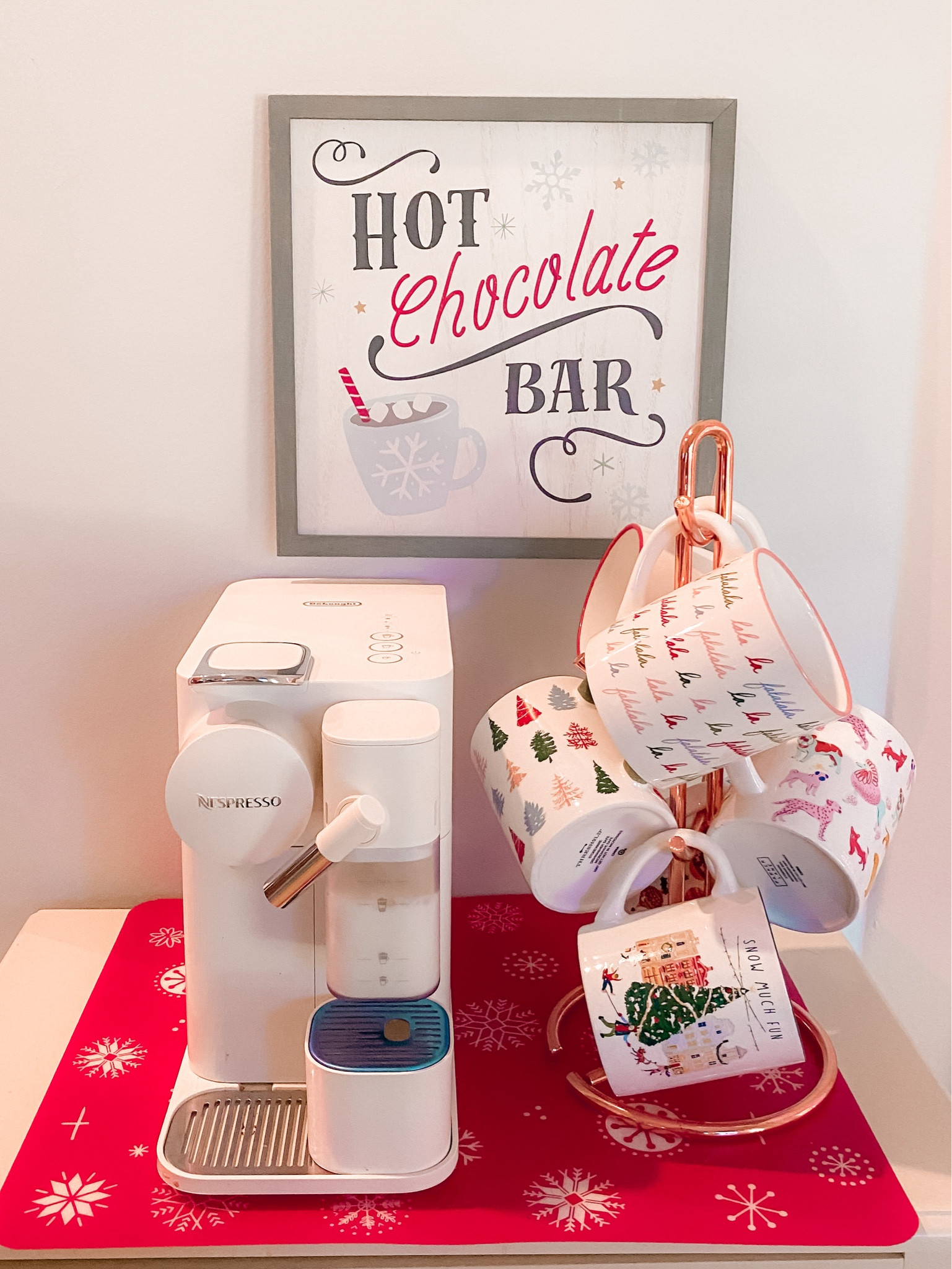 White nespresso machine with mug tree and Christmas mugs 

#LTKHoliday #LTKhome #LTKGiftGuide
