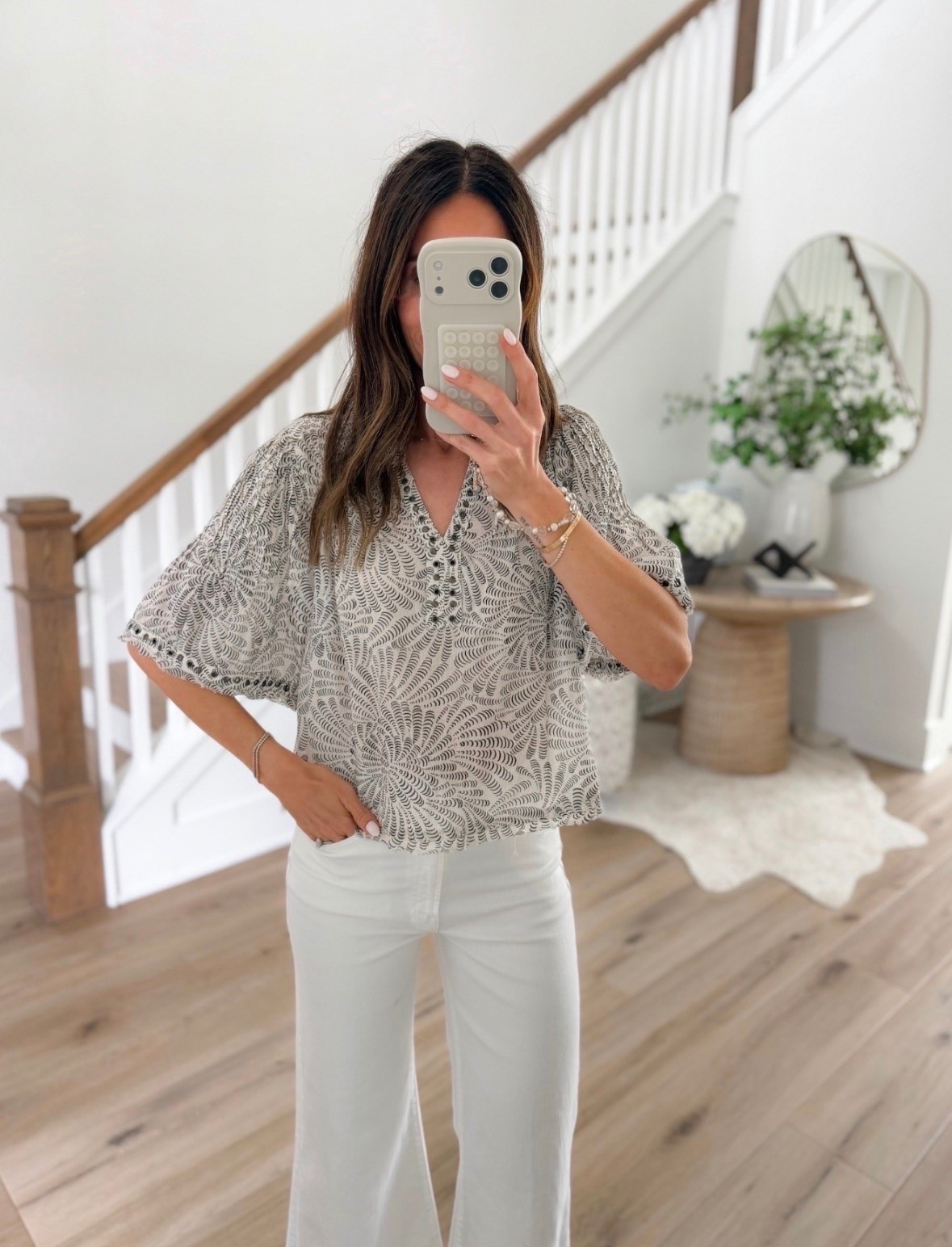 This printed blouse is one of those pieces that instantly elevates a simple pair of white jeans. The relaxed fit, subtle pattern, and lightweight fabric make it perfect for work, brunch, or any day you want to look polished with minimal effort.

Printed blouse, White jeans outfit, Summer blouse, Elevated basics, Casual chic, Work outfit, Everyday style, Lightweight top, Neutral outfit, Classic wardrobe, Outfit inspiration, annabrstyle

#LTKootd #LTKOver40 #LTKSeasonal