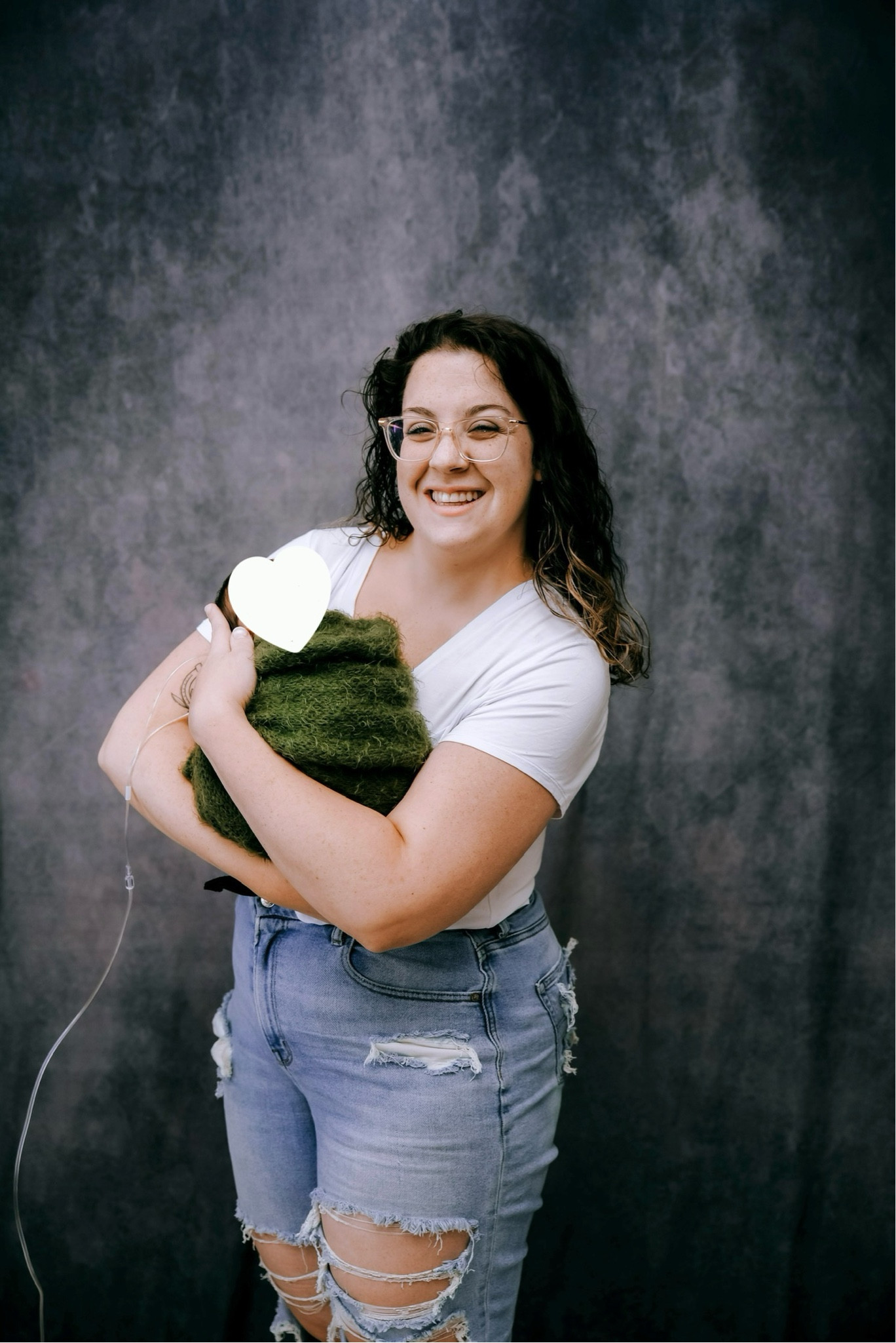 Newborn photos with my new baby! I went with a simple but comfortable look and picked out a white t shirt from posh peanut and my ripped American Eagle jeans. 

American Eagle | midsize mom | postpartum | newborn photos | photo shoot | posh peanut | bamboo clothes

#LTKMidsize #LTKBaby #LTKStyleTip