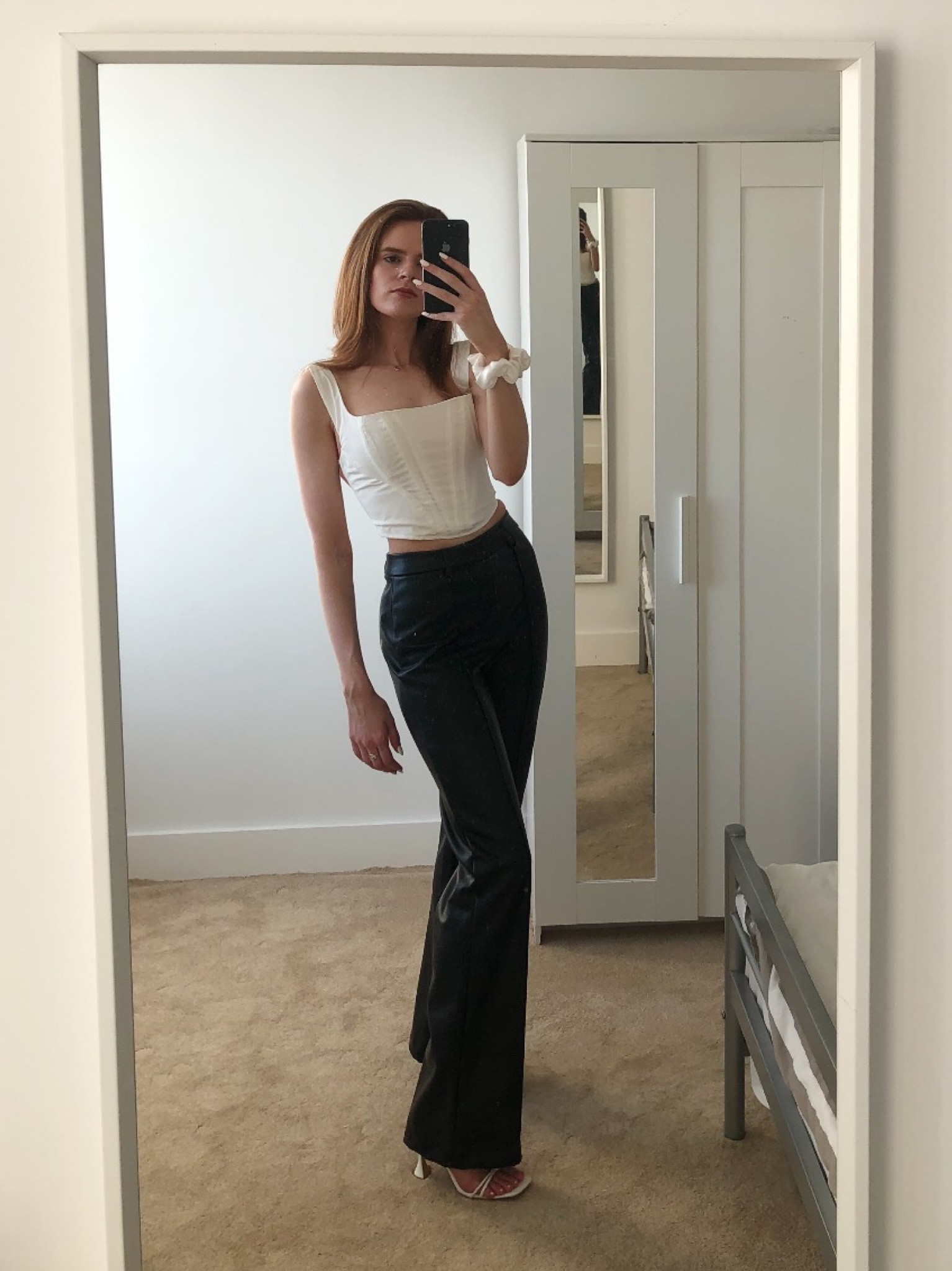 Cream corset and Leather Trousers Outfit. How to style leather trousers with a corset and heels #corset #outfit #streetwear #minimalstyle 

#LTKeurope #LTKSeasonal #LTKunder50
