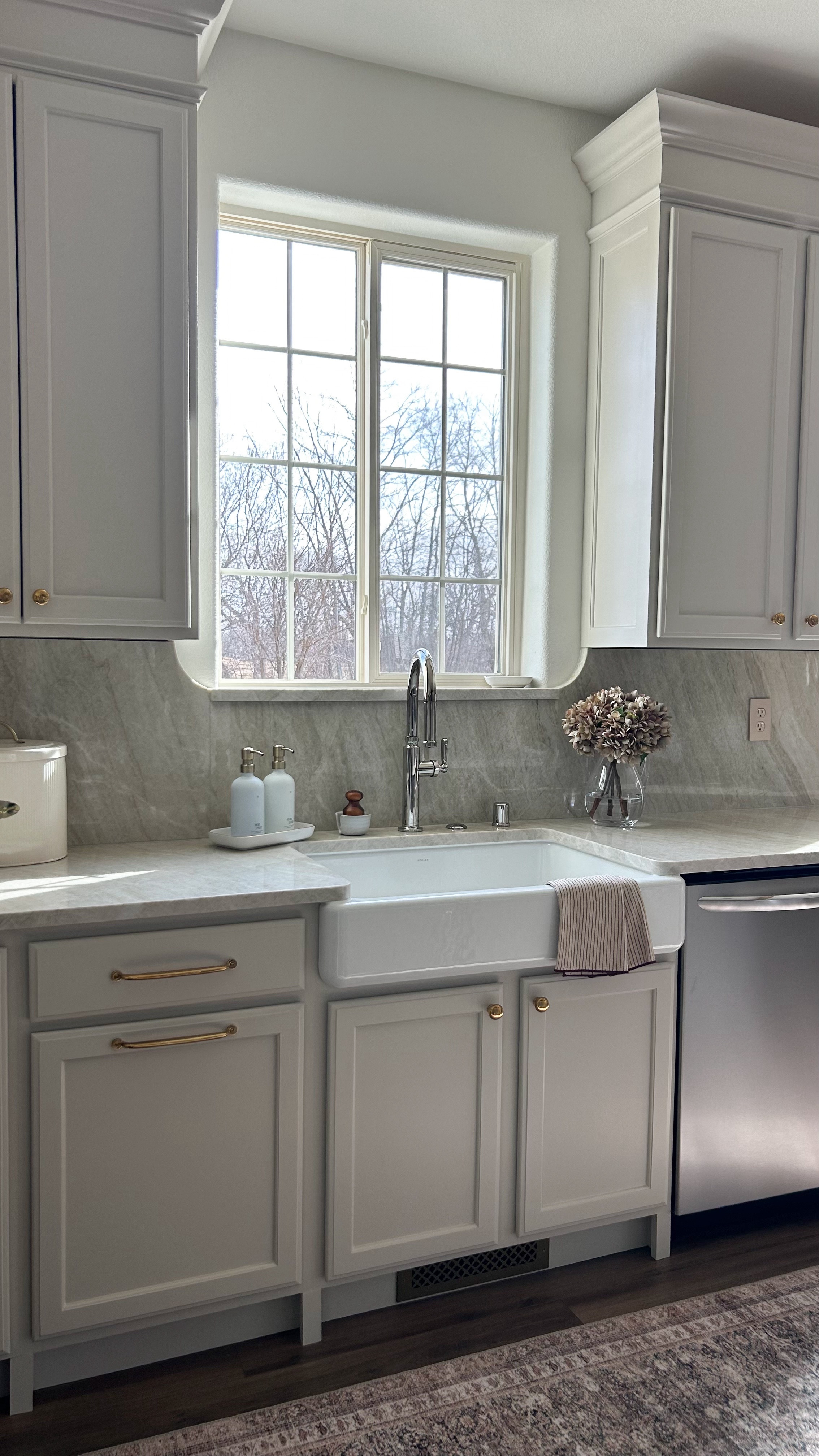 You don’t have to use a paint sprayer to get a nice finish on cabinets. (I used one to paint our island cabinets, but if you want to touch anything up, it’s a whole process to do so). So, I personally prefer to use an angled brush, a foam roller and self-leveling cabinet/trim paint! Touch-ups are so easy to do if you do it this way 🙌🏻 (we have 3 kids so it’s inevitable touch-ups are going to happen).

It is quite a process: Scuff sand, 2 coats of BIN Shellac primer (with sanding after each coat) & 3 coats of Sherwin Williams Emerald Urethane Trim Enamel (sanding after the first 2 coats). This color is: SW Accessible Beige.

Have you used a paint sprayer for painting cabinets?

#cabinetpainting #kitchencabinetupdate #paintingcabinets #kitchenupdate

#liketkit
@liketk.it
Kitchen
Kohler
Rejuvenation
Sherwin Williams
Paint


#LTKWatchNow #LTKHome #LTKFindsUnder100