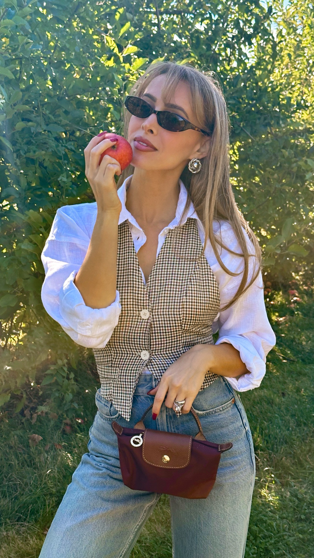 Love a layered look! My fall favorite is always a tailored vest with a button down shirt underneath. Paired it with my favorite denim from Agolde and loafers. For accessories I love this mini Longchamp with my favorite sunnies! I am petite tops are in a size XS and I believe my jeans are a 24. 

#LTKStyleTip #LTKPetite #LTKSeasonal