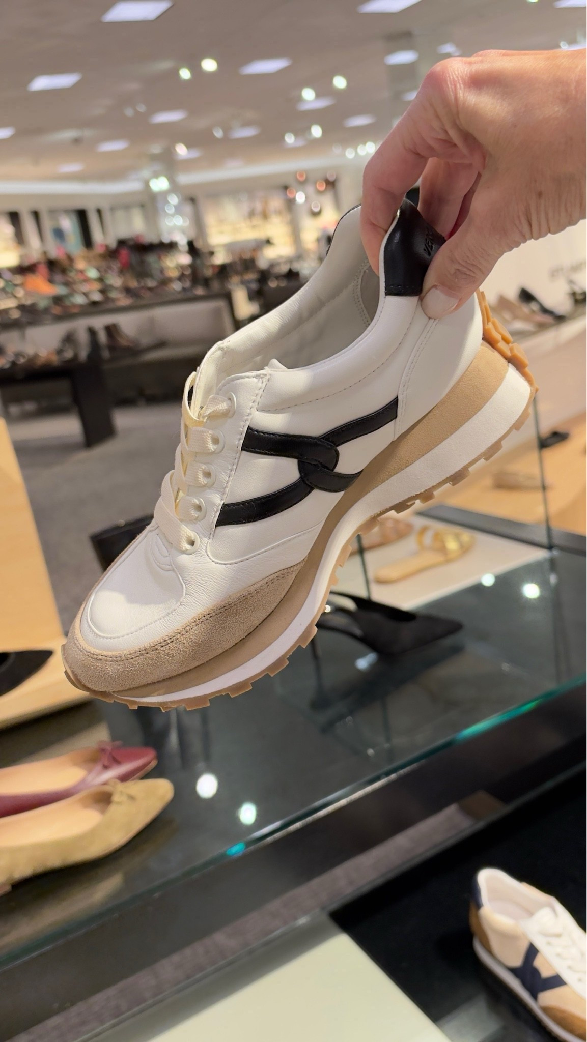 I haven’t loved a sneaker this much in so long!! Slips on and off, so comfortable, and a 2” lift (so good!!). True to size.