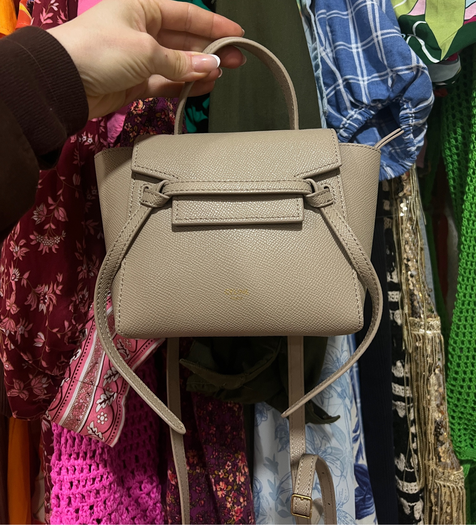 I am OBSESSED with this mini bag. I wear it all the time & the color is perfect. Sorry its kinda pricy :( she said bc its 1-1.